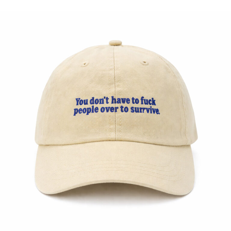 Cream Egotrips Dad Cap "You Don't Have To Fuck People Over To Survive" with front embroidered.